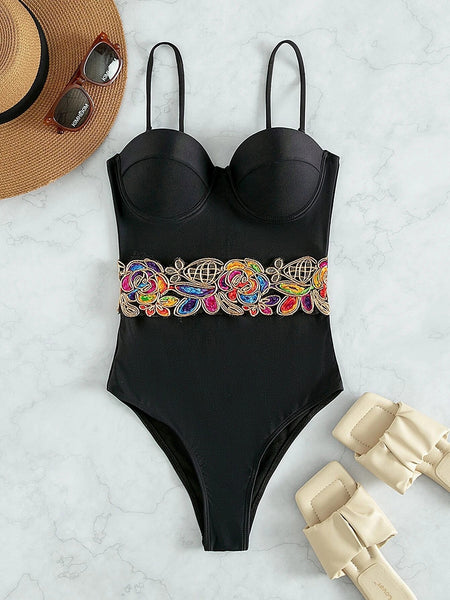 Black bandeau one-piece swimsuit looks skinny bikini
