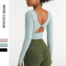 Load image into Gallery viewer, Autumn and winter seamless integrated yoga jacket with chest pad nude sports jacket yoga suit long sleeve
