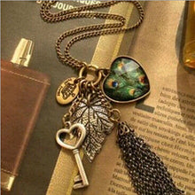 Load image into Gallery viewer, High Quality Retro Peacock Feather key Necklace